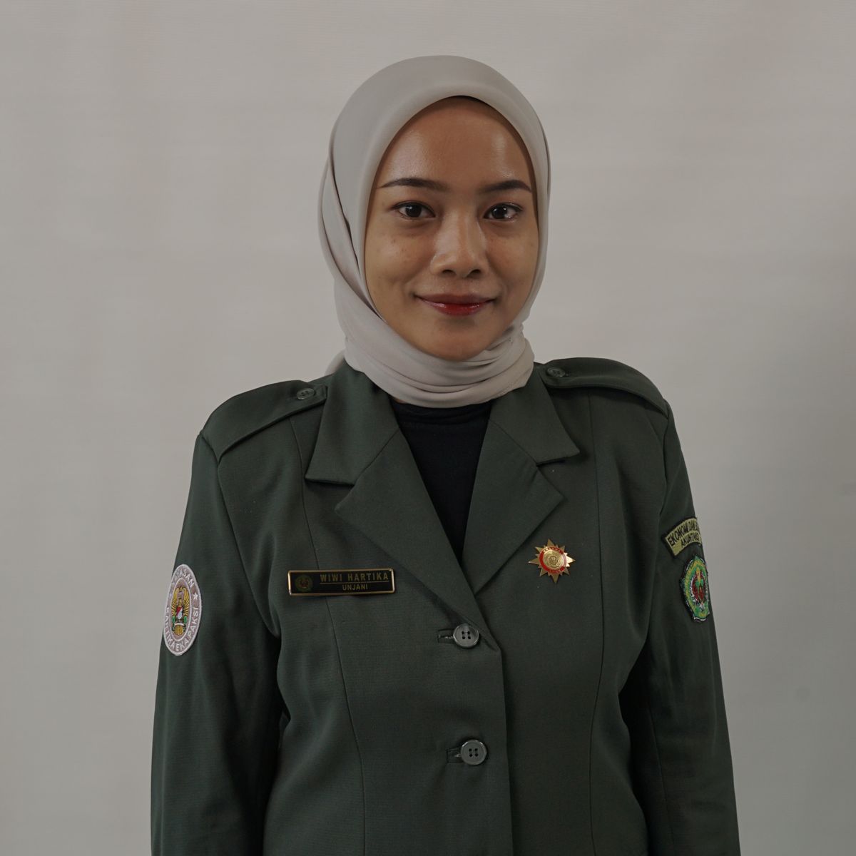 Wiwi Hartika, SE. M.Ak, CTT