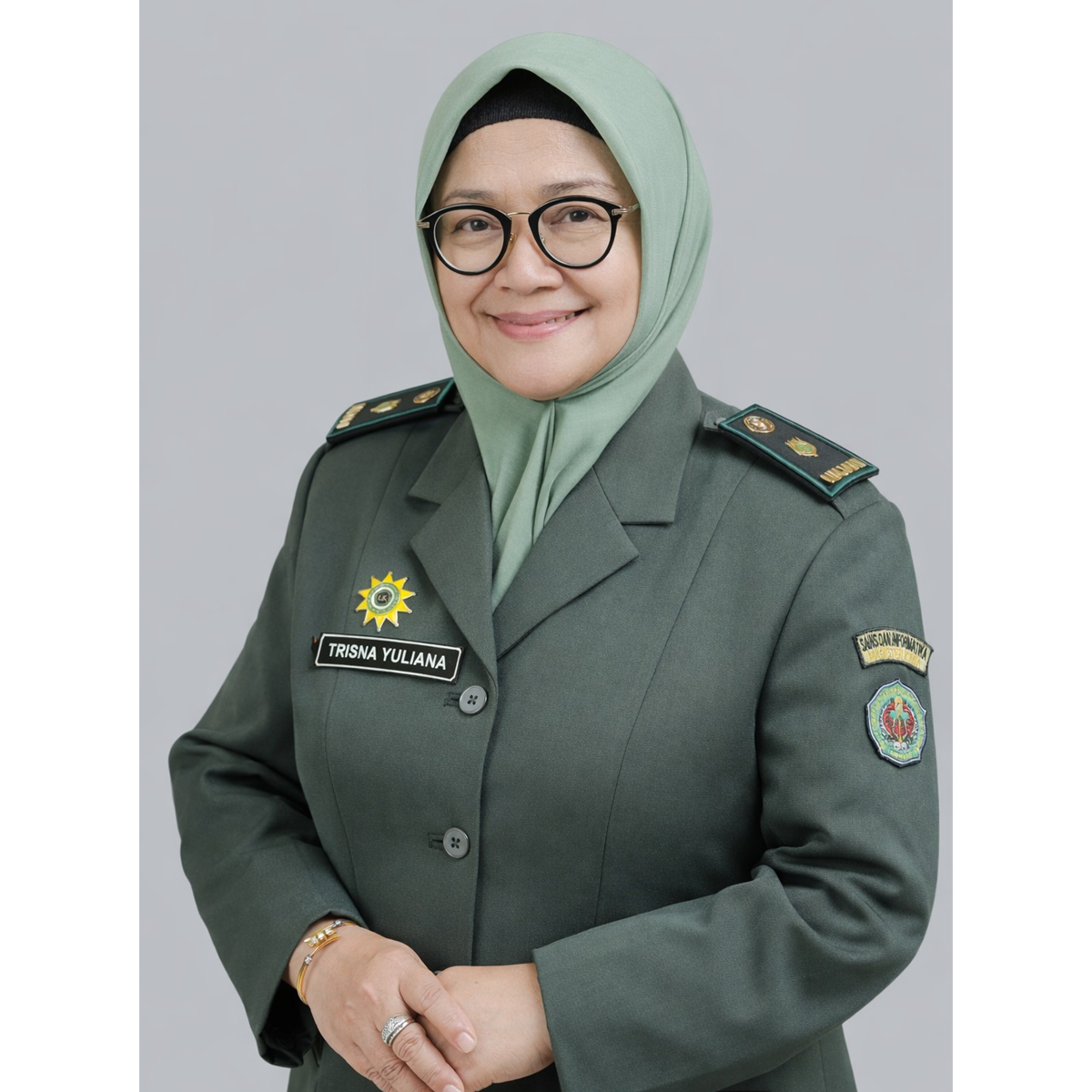Dr. Trisna Yuliana, M.Si.